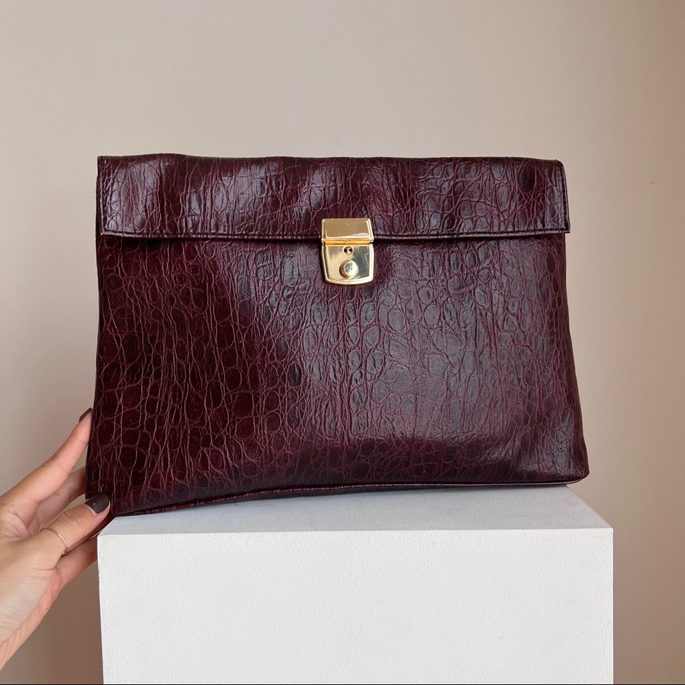 ASOS Vegan leather oversized clutch with gold closure detail
